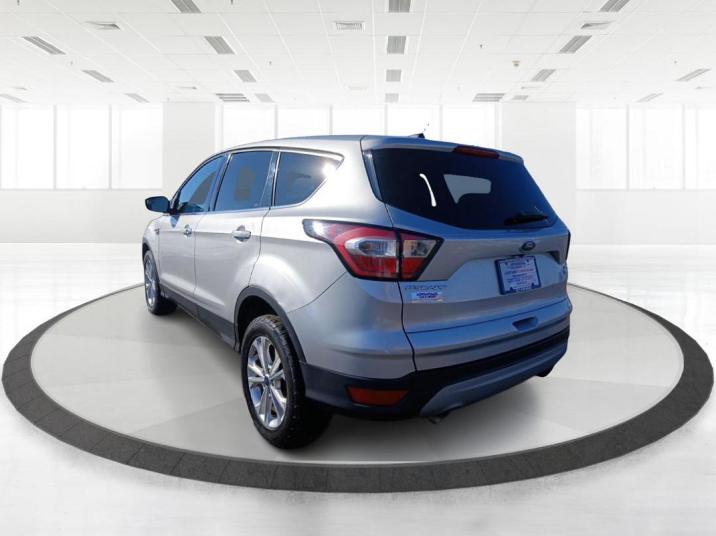 2017 Ford Escape SE 4WD (1FMCU9G92HU) with an 2.0L L4 DOHC 16V engine, 6-Speed Automatic transmission, located at 1184 Kauffman Ave, Fairborn, OH, 45324, (937) 908-9800, 39.807072, -84.031563 - Photo#4