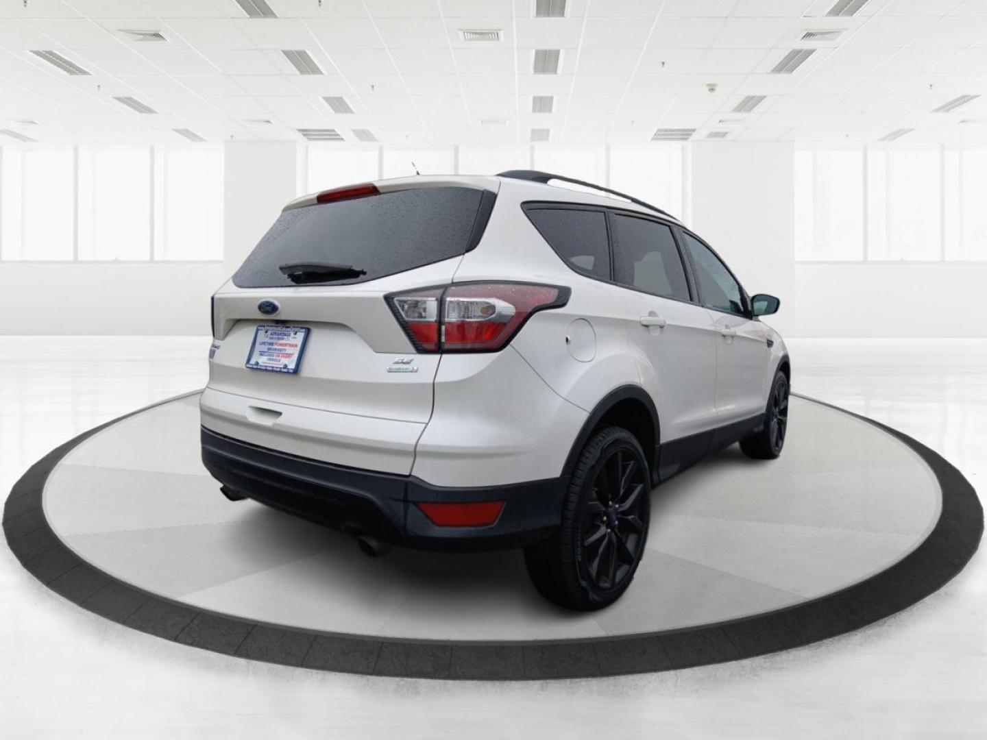 2017 Ford Escape SE FWD (1FMCU0GDXHU) with an 1.5L L4 DOHC 16V engine, 6-Speed Automatic transmission, located at 1951 S Dayton Lakeview Rd., New Carlisle, OH, 45344, (937) 908-9800, 39.890999, -84.050255 - Photo#2