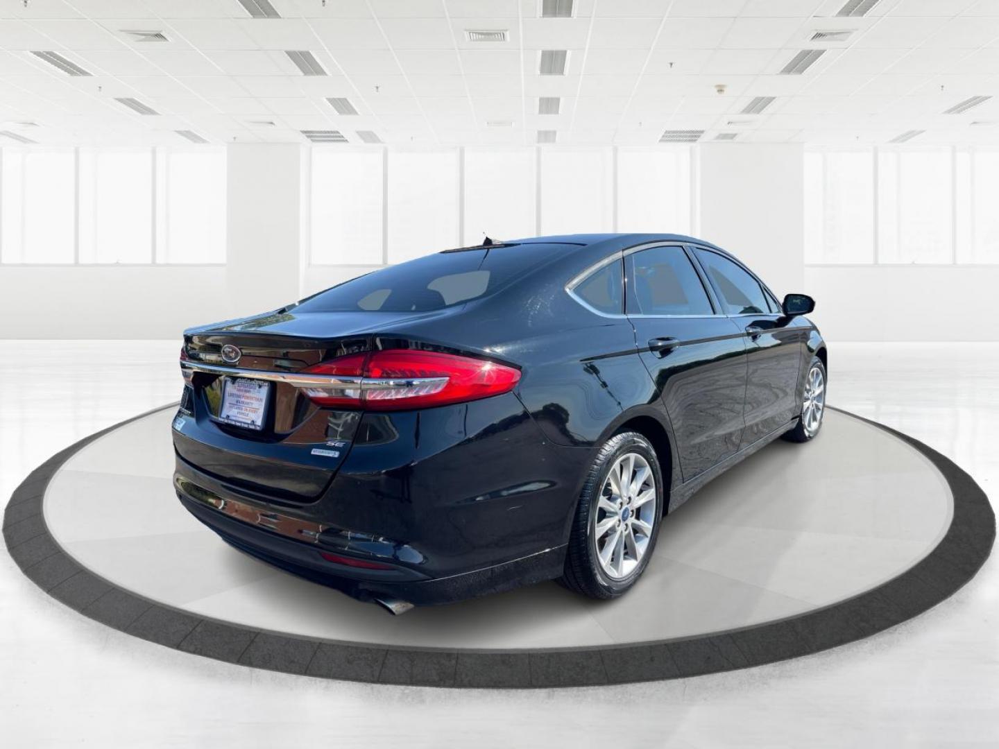 2017 Ford Fusion SE (3FA6P0HD1HR) with an 1.5L L4 DOHC 16V engine, 6-Speed Automatic transmission, located at 880 E. National Road, OH, 45377, (937) 908-9800, 39.891918, -84.183975 - Photo#2