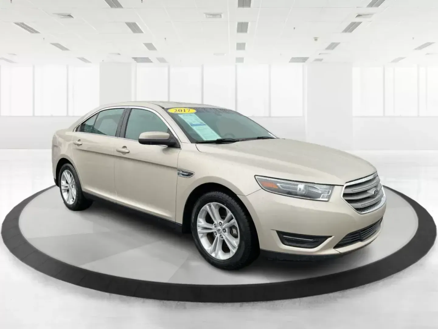 2017 Ford Taurus SEL (1FAHP2E86HG) with an EcoBoost 2L I-4 gasoline direct injection engine, located at 1230 East Main St, Xenia, OH, 45385, (937) 908-9800, 39.688042, -83.910538 - Photo#0