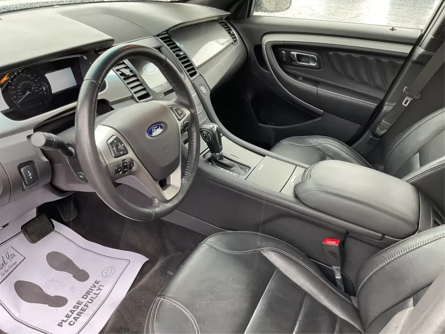 2017 Ford Taurus SEL (1FAHP2E86HG) with an EcoBoost 2L I-4 gasoline direct injection engine, located at 1230 East Main St, Xenia, OH, 45385, (937) 908-9800, 39.688042, -83.910538 - Photo#8