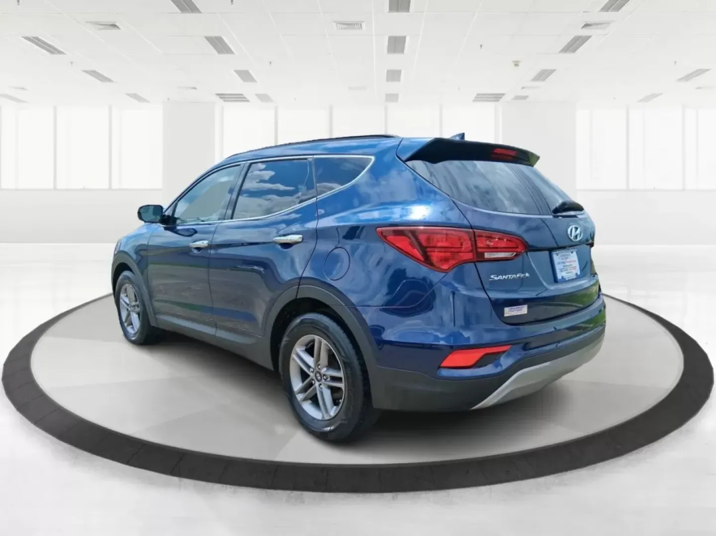 2017 Hyundai Santa Fe 2.4L (5XYZUDLB0HG) with an Theta II 2.4L I-4 gasoline direct injection engine, located at 880 E. National Road, OH, 45377, (937) 908-9800, 39.891918, -84.183975 - Photo#4