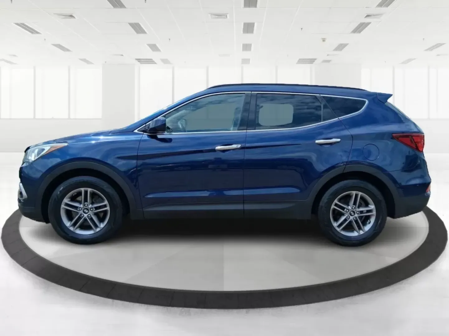 2017 Hyundai Santa Fe 2.4L (5XYZUDLB0HG) with an Theta II 2.4L I-4 gasoline direct injection engine, located at 880 E. National Road, OH, 45377, (937) 908-9800, 39.891918, -84.183975 - Photo#5