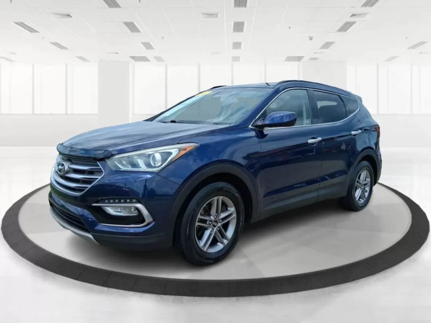 2017 Hyundai Santa Fe 2.4L (5XYZUDLB0HG) with an Theta II 2.4L I-4 gasoline direct injection engine, located at 880 E. National Road, OH, 45377, (937) 908-9800, 39.891918, -84.183975 - Photo#8