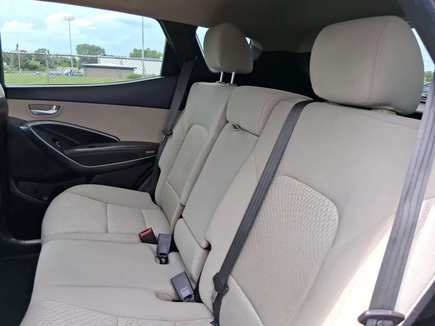 2017 Hyundai Santa Fe 2.4L (5XYZUDLB0HG) with an Theta II 2.4L I-4 gasoline direct injection engine, located at 880 E. National Road, OH, 45377, (937) 908-9800, 39.891918, -84.183975 - Photo#10