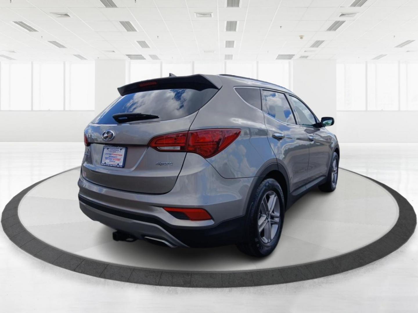2017 Hyundai Santa Fe Sport 2.4 FWD (5NMZU3LB7HH) with an 2.4L L4 DOHC 16V engine, 6-Speed Automatic transmission, located at 1230 East Main St, Xenia, OH, 45385, (937) 908-9800, 39.688042, -83.910538 - Photo#2