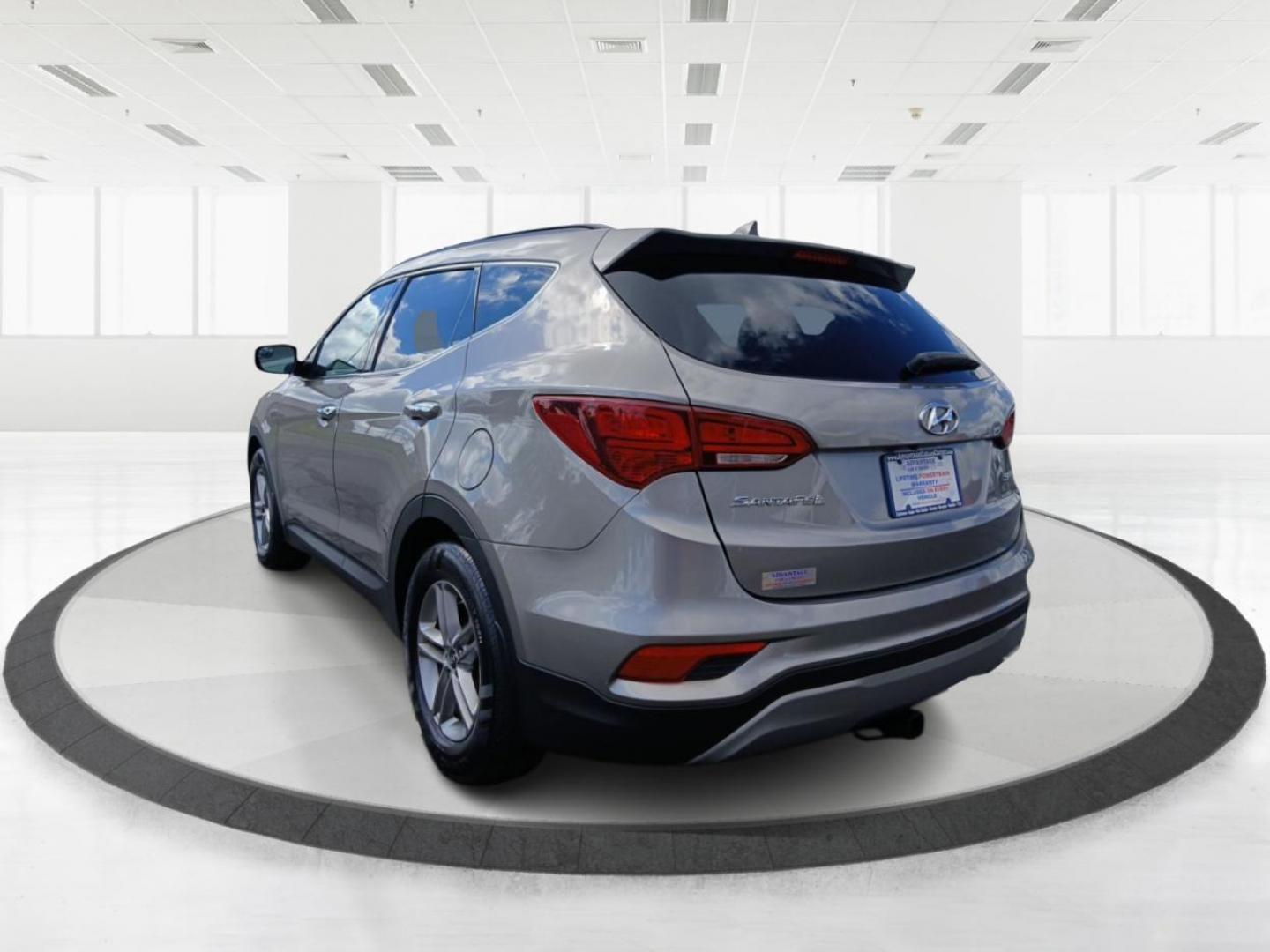 2017 Hyundai Santa Fe Sport 2.4 FWD (5NMZU3LB7HH) with an 2.4L L4 DOHC 16V engine, 6-Speed Automatic transmission, located at 1230 East Main St, Xenia, OH, 45385, (937) 908-9800, 39.688042, -83.910538 - Photo#4