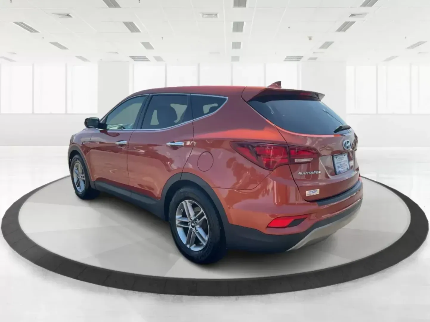 2017 Hyundai Santa Fe 2.4L (5XYZT3LB6HG) with an Theta II 2.4L I-4 gasoline direct injection engine, located at 4508 South Dixie Dr, Moraine, OH, 45439, (937) 908-9800, 39.807072, -84.031563 - Photo#4