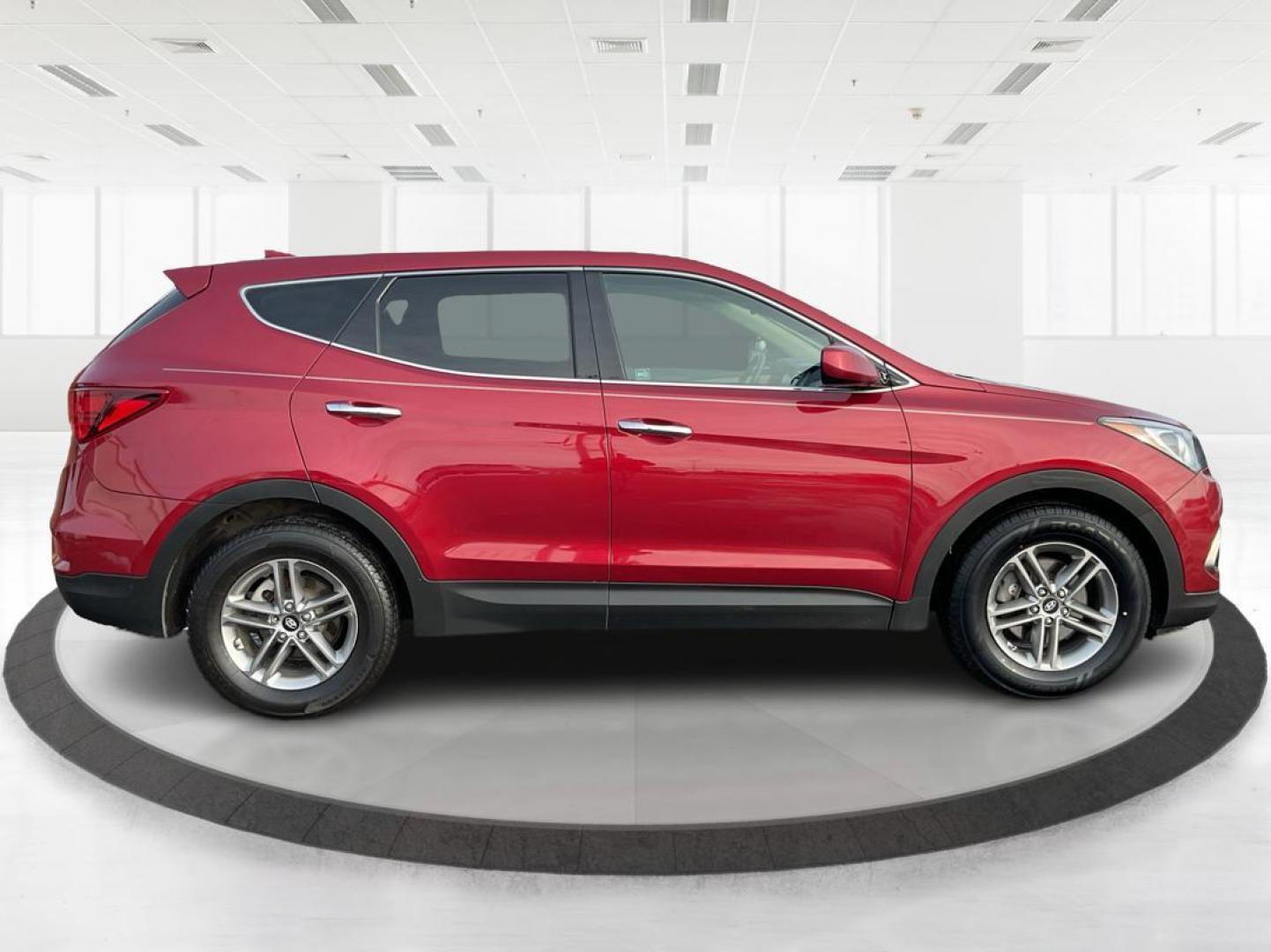 2017 Hyundai Santa Fe Sport 2.4L (5XYZT3LBXHG) with an Theta II 2.4L I-4 gasoline direct injection engine, located at 1099 N County Rd 25A , Troy, OH, 45373, (937) 908-9800, 40.057041, -84.215462 - Photo#1