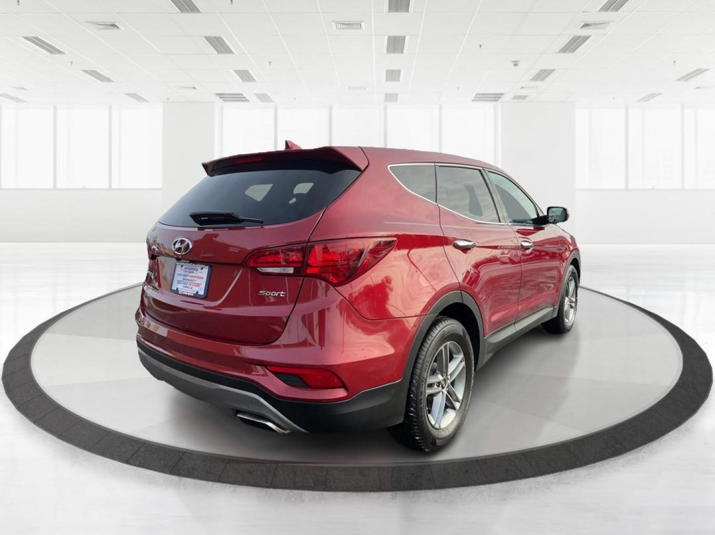 2017 Hyundai Santa Fe Sport 2.4L (5XYZT3LBXHG) with an Theta II 2.4L I-4 gasoline direct injection engine, located at 1099 N County Rd 25A , Troy, OH, 45373, (937) 908-9800, 40.057041, -84.215462 - Photo#2