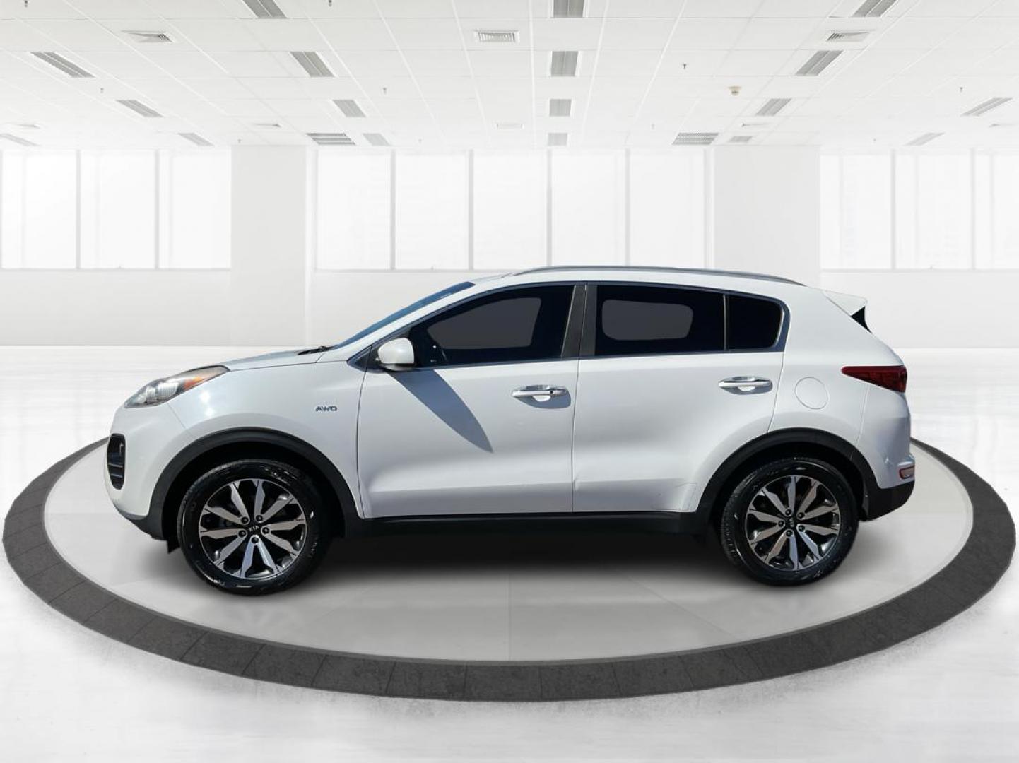 2017 Kia Sportage EX (KNDPNCAC0H7) with an Theta II 2.4L I-4 gasoline direct injection engine, located at 4508 South Dixie Dr, Moraine, OH, 45439, (937) 908-9800, 39.807072, -84.031563 - Photo#4