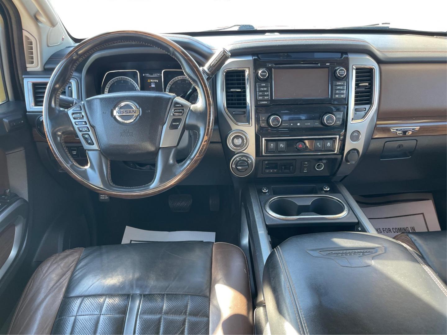 2017 Nissan Titan Platinum Reserve Crew Cab 4WD (1N6AA1E53HN) with an 5.6L V8 DOHC 32V engine, 6-Speed Automatic transmission, located at 880 E. National Road, OH, 45377, (937) 908-9800, 39.891918, -84.183975 - Photo#20