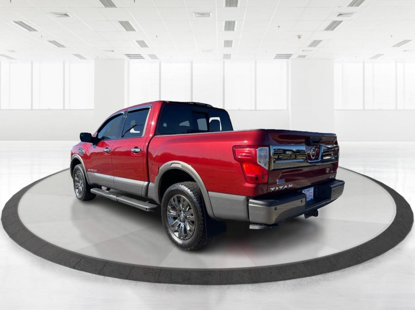 2017 Nissan Titan Platinum Reserve Crew Cab 4WD (1N6AA1E53HN) with an 5.6L V8 DOHC 32V engine, 6-Speed Automatic transmission, located at 880 E. National Road, OH, 45377, (937) 908-9800, 39.891918, -84.183975 - Photo#4