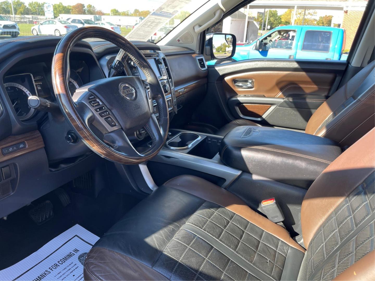 2017 Nissan Titan Platinum Reserve Crew Cab 4WD (1N6AA1E53HN) with an 5.6L V8 DOHC 32V engine, 6-Speed Automatic transmission, located at 880 E. National Road, OH, 45377, (937) 908-9800, 39.891918, -84.183975 - Photo#8