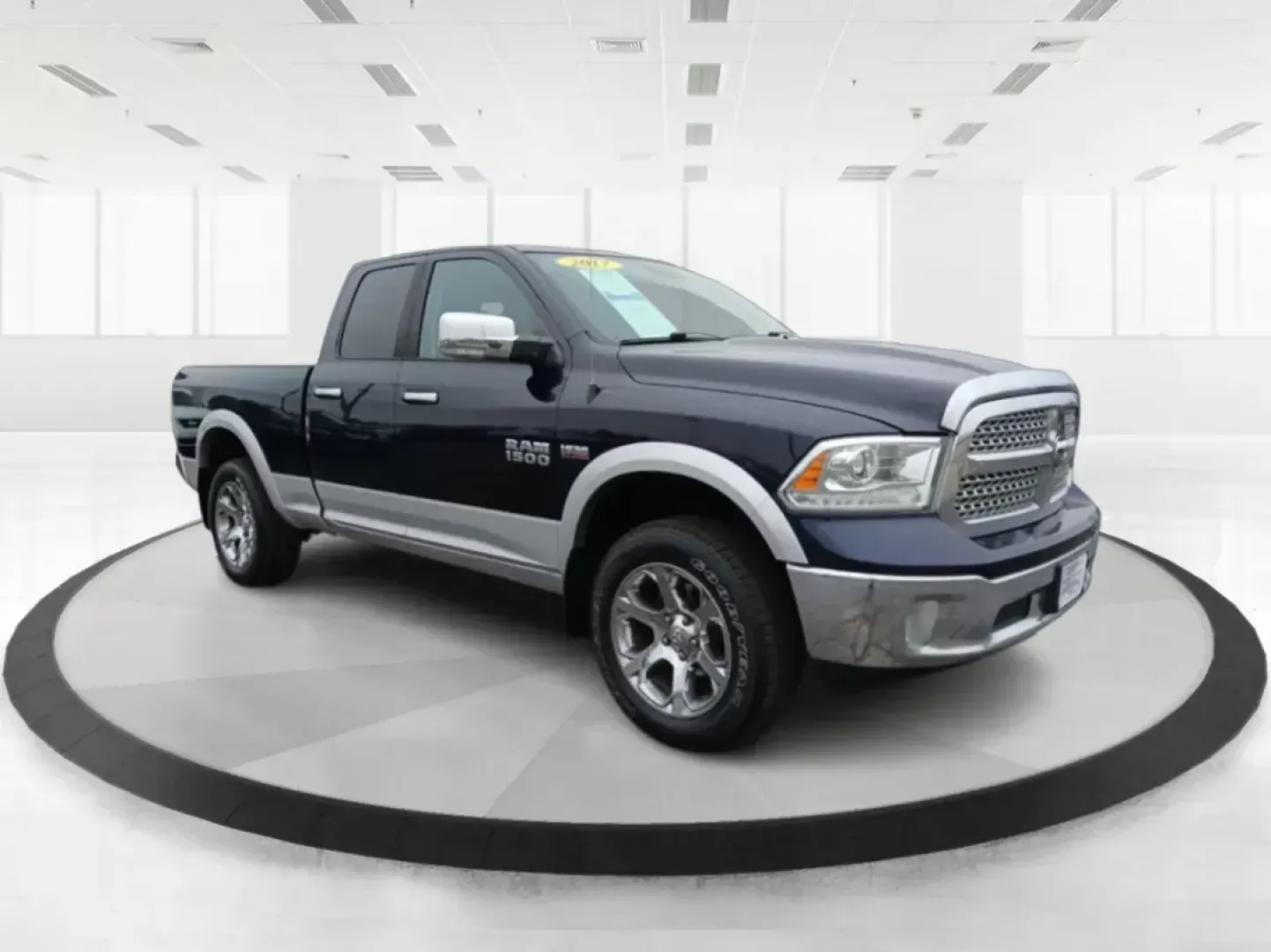 2017 Ram 1500 Laramie Quad Cab 4WD (1C6RR7JT1HS) with an 5.7L V8 OHV 16V engine, 8-Speed Automatic transmission, located at 4508 South Dixie Dr, Moraine, OH, 45439, (937) 908-9800, 39.807072, -84.031563 - Photo#0