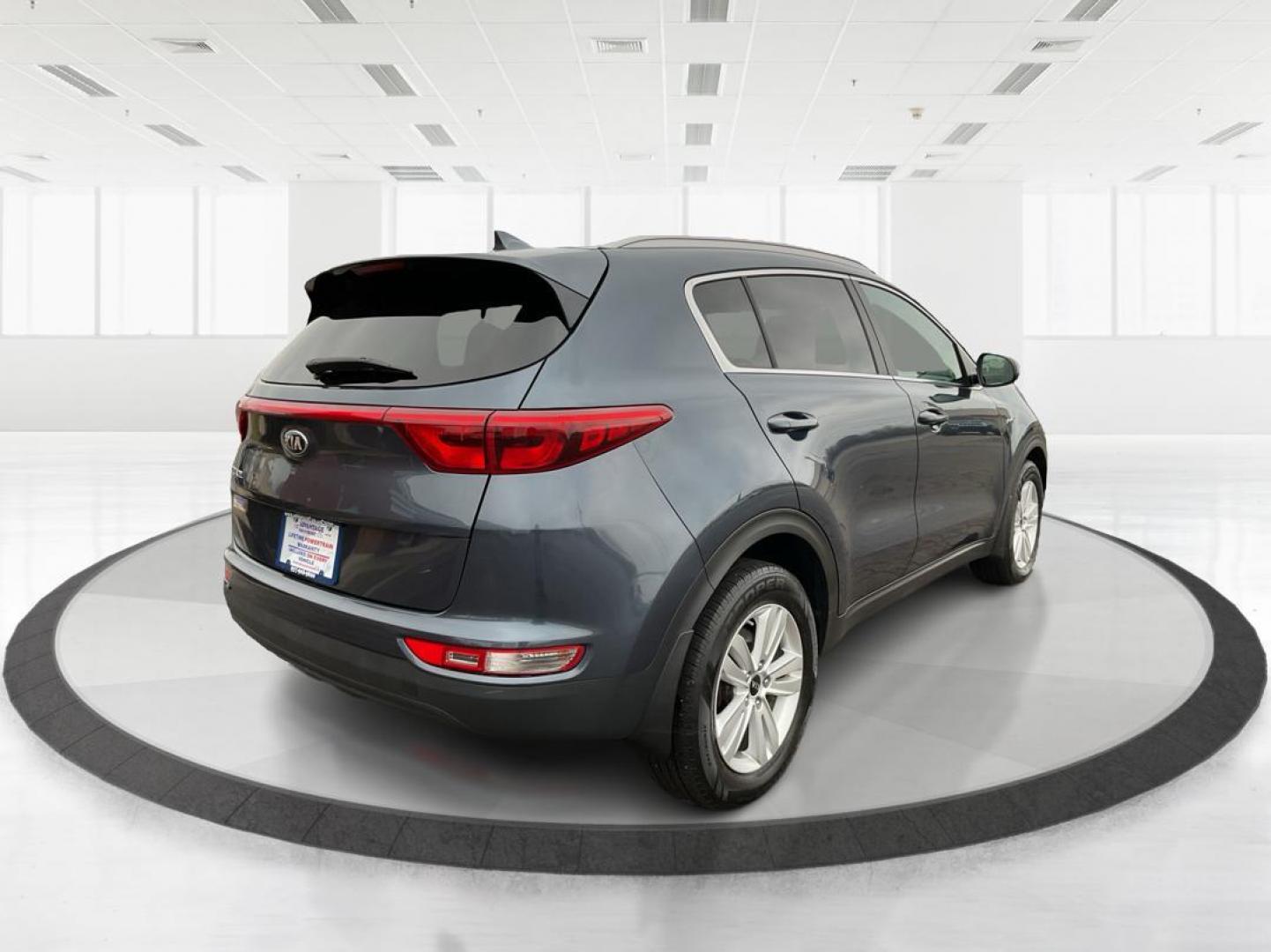 2019 Kia Sportage LX (KNDPMCAC2K7) with an Theta II 2.4L I-4 gasoline direct injection engine, located at 1951 S Dayton Lakeview Rd., New Carlisle, OH, 45344, (937) 908-9800, 39.890999, -84.050255 - Photo#2