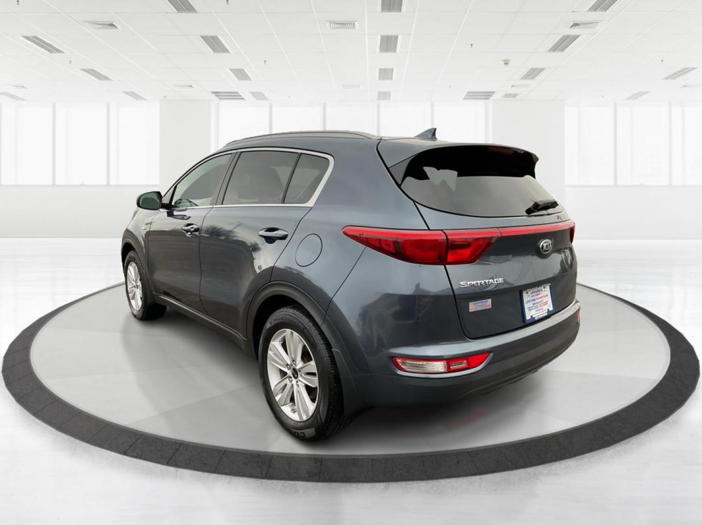 2019 Kia Sportage LX (KNDPMCAC2K7) with an Theta II 2.4L I-4 gasoline direct injection engine, located at 1951 S Dayton Lakeview Rd., New Carlisle, OH, 45344, (937) 908-9800, 39.890999, -84.050255 - Photo#4