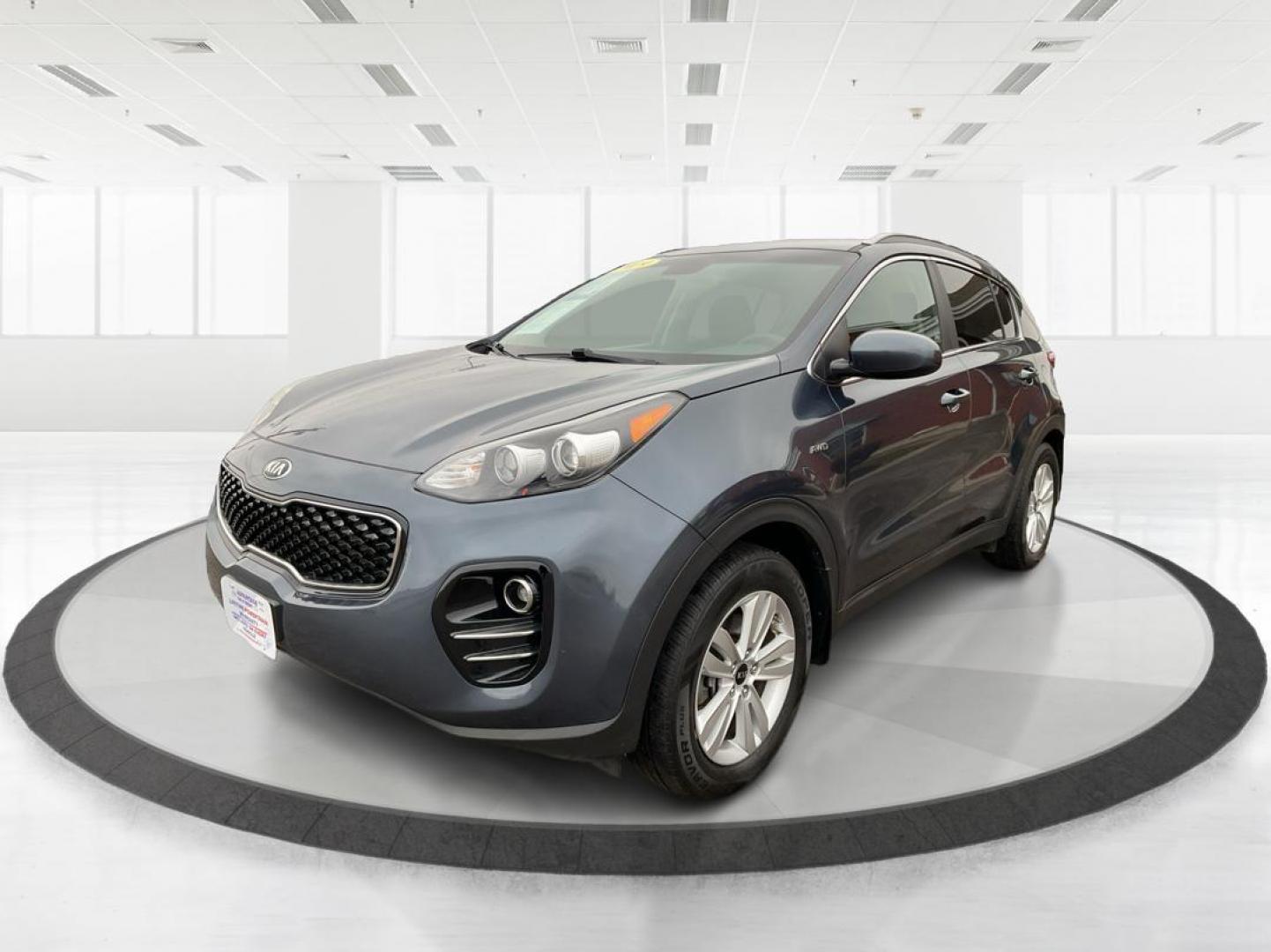 2019 Kia Sportage LX (KNDPMCAC2K7) with an Theta II 2.4L I-4 gasoline direct injection engine, located at 1951 S Dayton Lakeview Rd., New Carlisle, OH, 45344, (937) 908-9800, 39.890999, -84.050255 - Photo#7