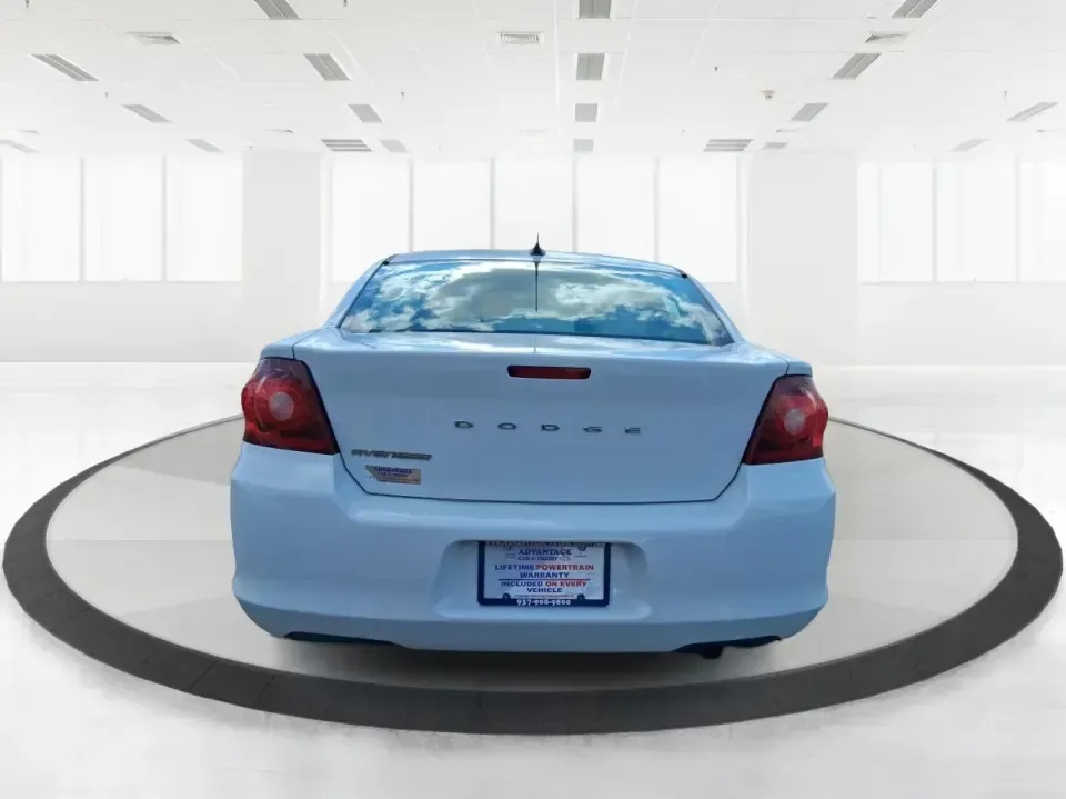 2014 Dodge Avenger SE (1C3CDZAB7EN) with an 2.4L L4 DOHC 16V engine, 4-Speed Automatic transmission, located at 4508 South Dixie Dr, Moraine, OH, 45439, (937) 908-9800, 39.689976, -84.218452 - Need a dependable sedan for the daily commute down I-75, quick school drop-offs, or weekend errands around Dayton-without the stress of traditional bank financing? This 2014 Dodge Avenger SE is a practical, comfortable choice for budget-conscious buyers who want a straightforward ride with the right - Photo#3