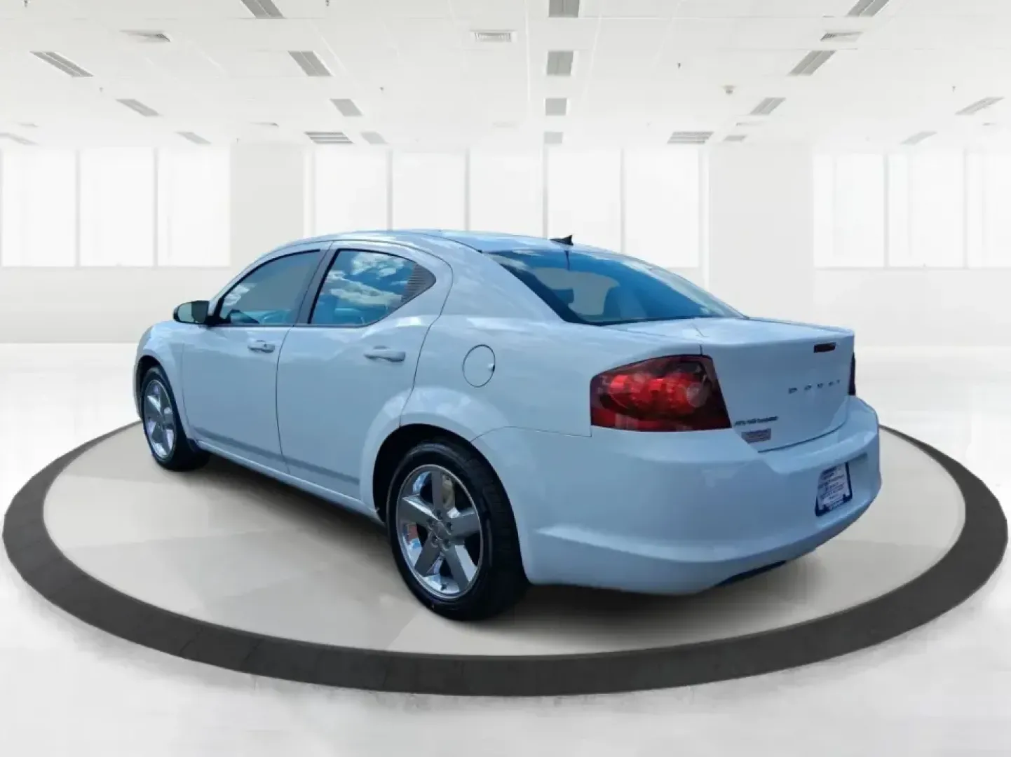 2014 Dodge Avenger SE (1C3CDZAB7EN) with an 2.4L L4 DOHC 16V engine, 4-Speed Automatic transmission, located at 4508 South Dixie Dr, Moraine, OH, 45439, (937) 908-9800, 39.689976, -84.218452 - Need a dependable sedan for the daily commute down I-75, quick school drop-offs, or weekend errands around Dayton-without the stress of traditional bank financing? This 2014 Dodge Avenger SE is a practical, comfortable choice for budget-conscious buyers who want a straightforward ride with the right - Photo#4