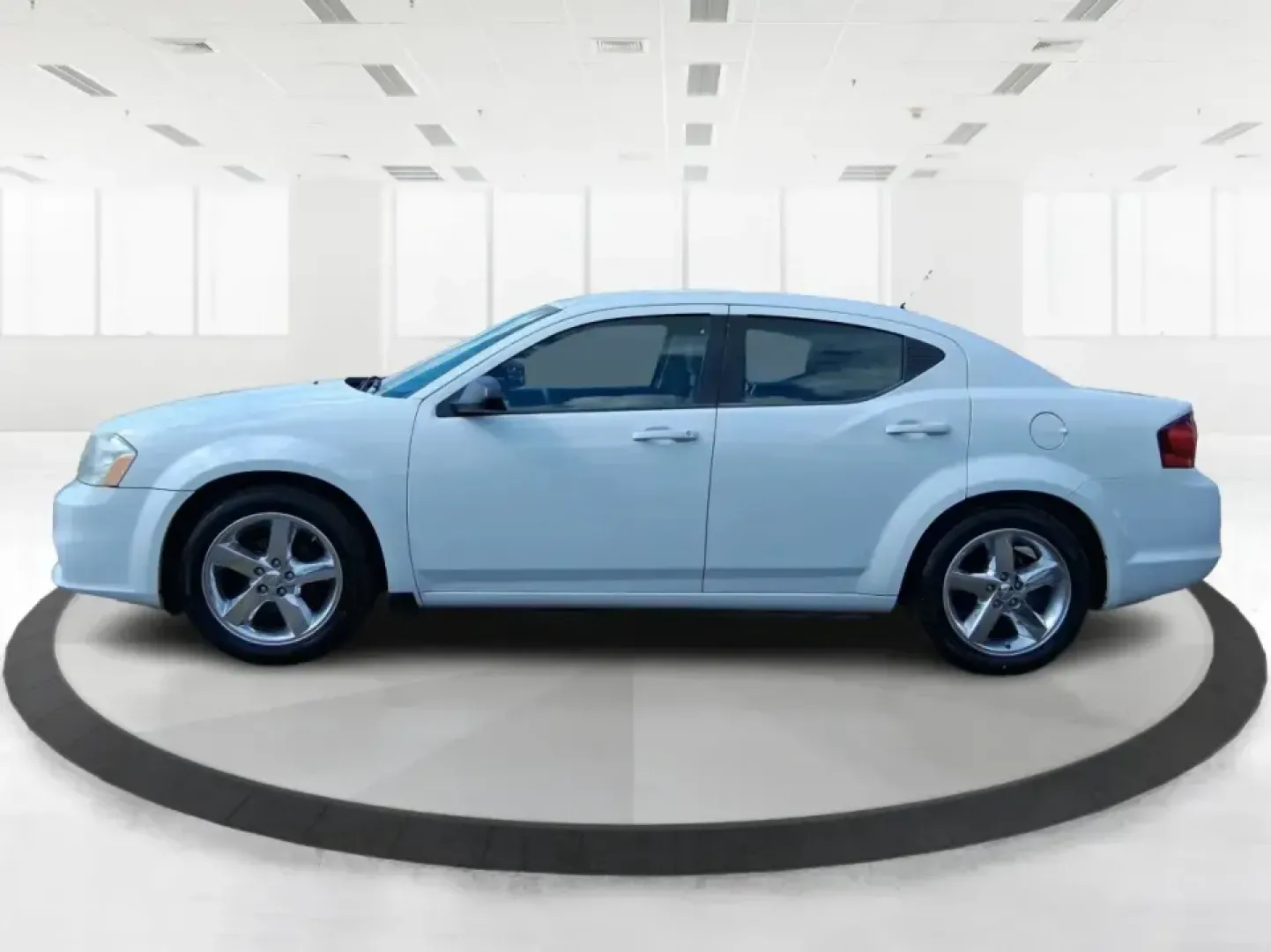 2014 Dodge Avenger SE (1C3CDZAB7EN) with an 2.4L L4 DOHC 16V engine, 4-Speed Automatic transmission, located at 4508 South Dixie Dr, Moraine, OH, 45439, (937) 908-9800, 39.689976, -84.218452 - Need a dependable sedan for the daily commute down I-75, quick school drop-offs, or weekend errands around Dayton-without the stress of traditional bank financing? This 2014 Dodge Avenger SE is a practical, comfortable choice for budget-conscious buyers who want a straightforward ride with the right - Photo#5