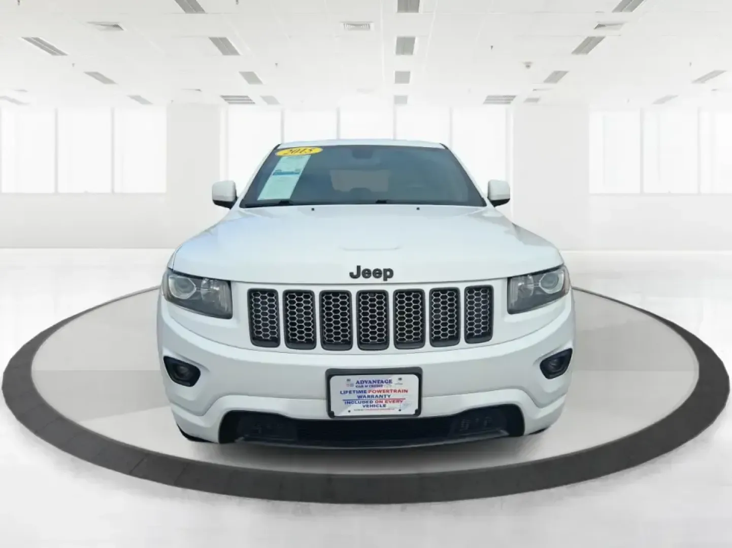 2015 Jeep Grand Cherokee Altitude (1C4RJFAG9FC) with an 3.6L V-6 DOHC engine, 8-Speed Automatic transmission, located at 1099 N County Rd 25A , Troy, OH, 45373, (937) 908-9800, 40.057079, -84.212883 - Weekend getaways to Hocking Hills, snowy school runs, or a confident daily commute up I75 feel easier when your SUV is built for real Ohio weather and real-life schedules. This 2015 Jeep Grand Cherokee Altitude in Bright White Clearcoat is the kind of capable, comfortable SUV that fits busy families - Photo#7