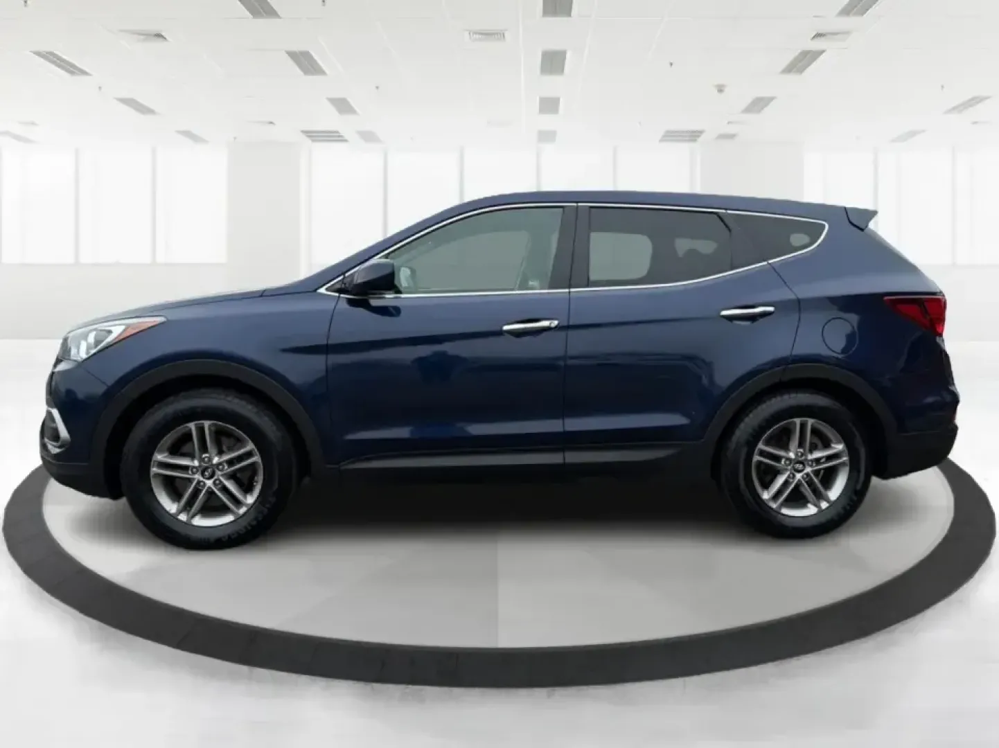 2018 Hyundai Santa Fe 2.4L (5XYZTDLB6JG) with an Theta II 2.4L I-4 gasoline direct injection engine, 6A transmission, located at 8750 N County Rd 25A, Piqua, OH, 45356, (937) 908-9800, 40.164391, -84.232513 - Road trips to Indian Lake, snowy school runs, and everyday commuting up and down I75 feel a lot easier when your SUV is roomy, confident in bad weather, and comfortable for everyone on board. This 2018 Hyundai Santa Fe 2.4L in striking Nightfall Blue is a practical, family-friendly sport utility tha - Photo#5