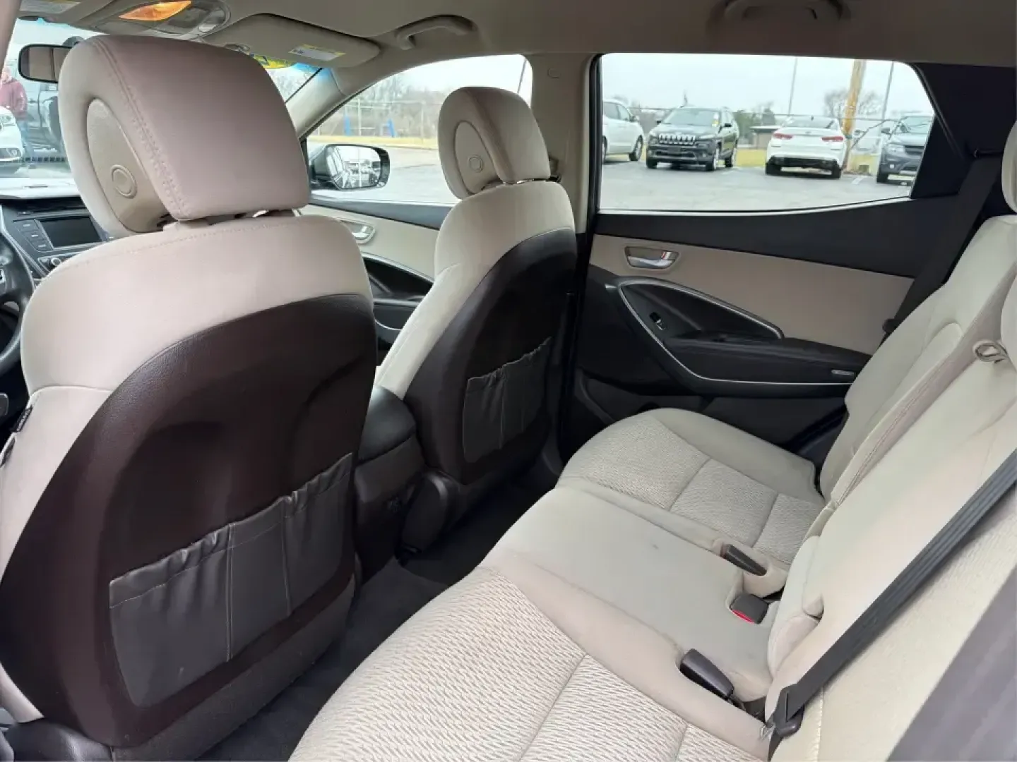 2018 Hyundai Santa Fe 2.4L (5XYZTDLB6JG) with an Theta II 2.4L I-4 gasoline direct injection engine, 6A transmission, located at 8750 N County Rd 25A, Piqua, OH, 45356, (937) 908-9800, 40.164391, -84.232513 - Road trips to Indian Lake, snowy school runs, and everyday commuting up and down I75 feel a lot easier when your SUV is roomy, confident in bad weather, and comfortable for everyone on board. This 2018 Hyundai Santa Fe 2.4L in striking Nightfall Blue is a practical, family-friendly sport utility tha - Photo#10