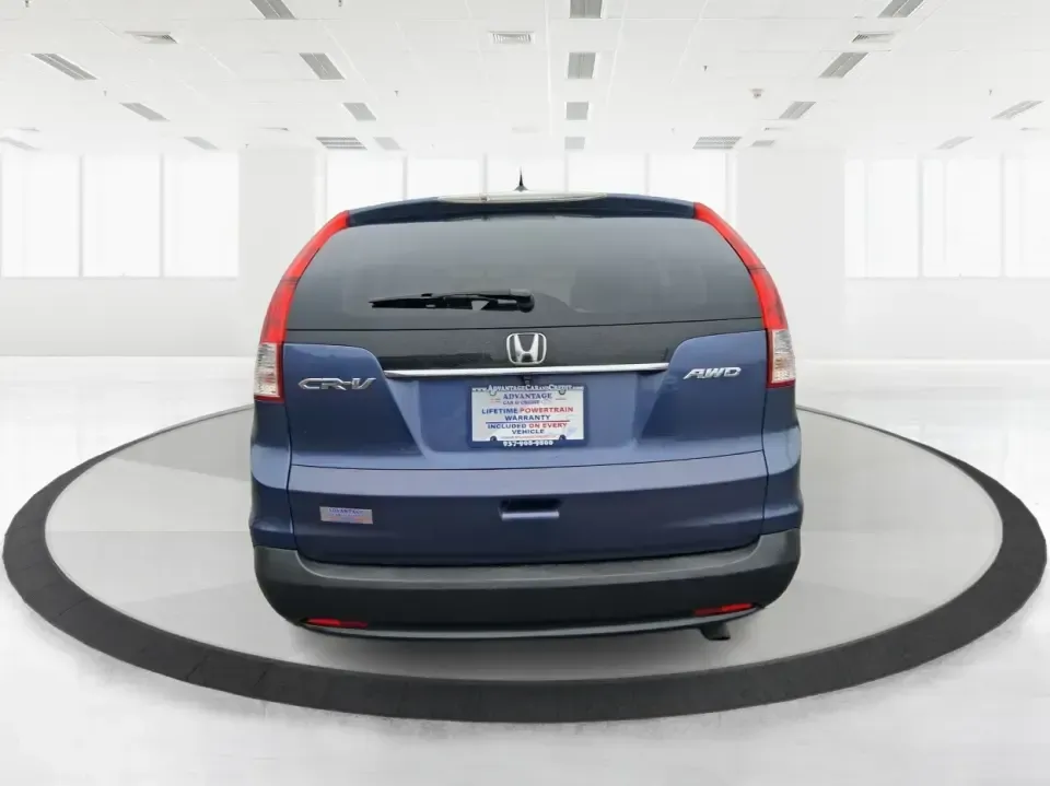 2013 Honda CR-V EX-L (2HKRM4H74DH) with an 2.4L I-4 DOHC engine, 5-Speed Automatic transmission, located at 1099 N County Rd 25A , Troy, OH, 45373, (937) 908-9800, 40.057079, -84.212883 - Picture your next weekend: a quick run up I75 for a Dayton Dragons game, a family trip to Treasure Island Park, or a snowy school-morning commute across Troy-without stressing about space, comfort, or traction. This 2013 Honda CRV EXL in Twilight Blue Metallic is the kind of do-it-all SUV that fits - Photo#3