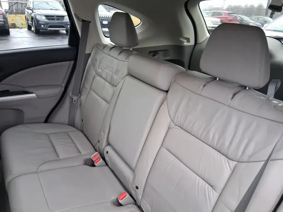 2013 Honda CR-V EX-L (2HKRM4H74DH) with an 2.4L I-4 DOHC engine, 5-Speed Automatic transmission, located at 1099 N County Rd 25A , Troy, OH, 45373, (937) 908-9800, 40.057079, -84.212883 - Picture your next weekend: a quick run up I75 for a Dayton Dragons game, a family trip to Treasure Island Park, or a snowy school-morning commute across Troy-without stressing about space, comfort, or traction. This 2013 Honda CRV EXL in Twilight Blue Metallic is the kind of do-it-all SUV that fits - Photo#10