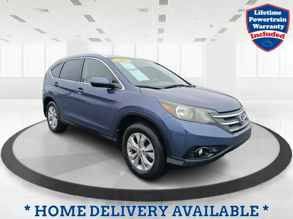 2013 Honda CR-V EX-L (2HKRM4H74DH) with an 2.4L I-4 DOHC engine, 5-Speed Automatic transmission, located at 1099 N County Rd 25A , Troy, OH, 45373, (937) 908-9800, 40.057079, -84.212883 - Picture your next weekend: a quick run up I75 for a Dayton Dragons game, a family trip to Treasure Island Park, or a snowy school-morning commute across Troy-without stressing about space, comfort, or traction. This 2013 Honda CRV EXL in Twilight Blue Metallic is the kind of do-it-all SUV that fits - Photo#0