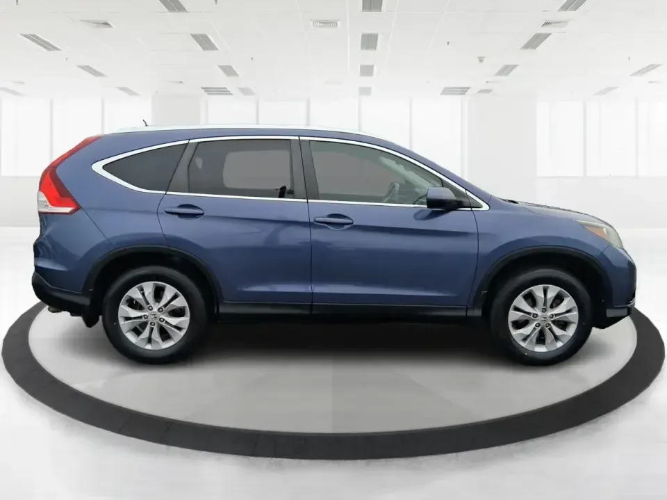 2013 Honda CR-V EX-L (2HKRM4H74DH) with an 2.4L I-4 DOHC engine, 5-Speed Automatic transmission, located at 1184 Kauffman Ave, Fairborn, OH, 45324, (937) 908-9800, 39.807072, -84.030914 - Picture your next weekend: a quick run up I75 for a Dayton Dragons game, a family trip to Treasure Island Park, or a snowy school-morning commute across Troy-without stressing about space, comfort, or traction. This 2013 Honda CRV EXL in Twilight Blue Metallic is the kind of do-it-all SUV that fits - Photo#1