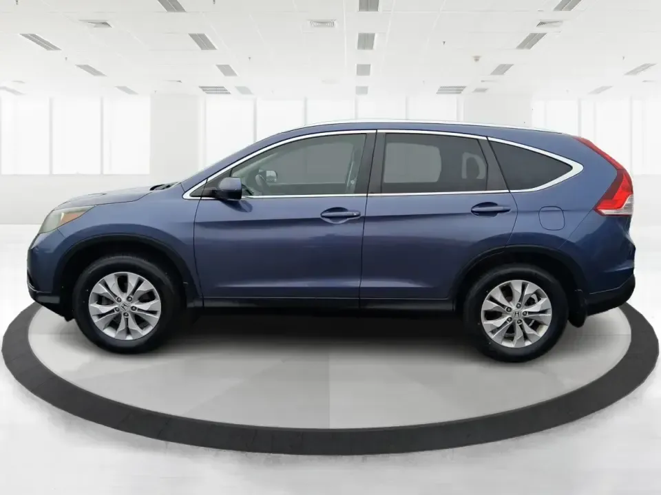 2013 Honda CR-V EX-L (2HKRM4H74DH) with an 2.4L I-4 DOHC engine, 5-Speed Automatic transmission, located at 1184 Kauffman Ave, Fairborn, OH, 45324, (937) 908-9800, 39.807072, -84.030914 - Picture your next weekend: a quick run up I75 for a Dayton Dragons game, a family trip to Treasure Island Park, or a snowy school-morning commute across Troy-without stressing about space, comfort, or traction. This 2013 Honda CRV EXL in Twilight Blue Metallic is the kind of do-it-all SUV that fits - Photo#5