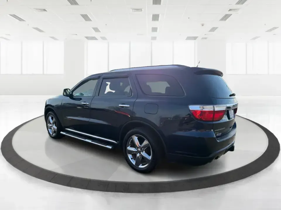 2013 Dodge Durango Citadel (1C4SDJET6DC) with an 5.7L V8 OHV 16V engine, 5-Speed Automatic transmission, located at 8750 N County Rd 25A, Piqua, OH, 45356, (937) 908-9800, 40.164391, -84.232513 - Need one SUV that can handle school drop-offs, I-75 commutes, and a loaded-up weekend trip to Indian Lake or a tailgate in Dayton-without giving up comfort or capability? This 2013 Dodge Durango Citadel in True Blue Pearlcoat is built for real-life Ohio driving, with confident 4WD/AWD traction, V8 p - Photo#4