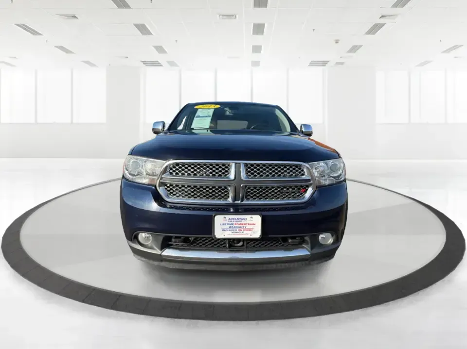 2013 Dodge Durango Citadel (1C4SDJET6DC) with an 5.7L V8 OHV 16V engine, 5-Speed Automatic transmission, located at 8750 N County Rd 25A, Piqua, OH, 45356, (937) 908-9800, 40.164391, -84.232513 - Need one SUV that can handle school drop-offs, I-75 commutes, and a loaded-up weekend trip to Indian Lake or a tailgate in Dayton-without giving up comfort or capability? This 2013 Dodge Durango Citadel in True Blue Pearlcoat is built for real-life Ohio driving, with confident 4WD/AWD traction, V8 p - Photo#7