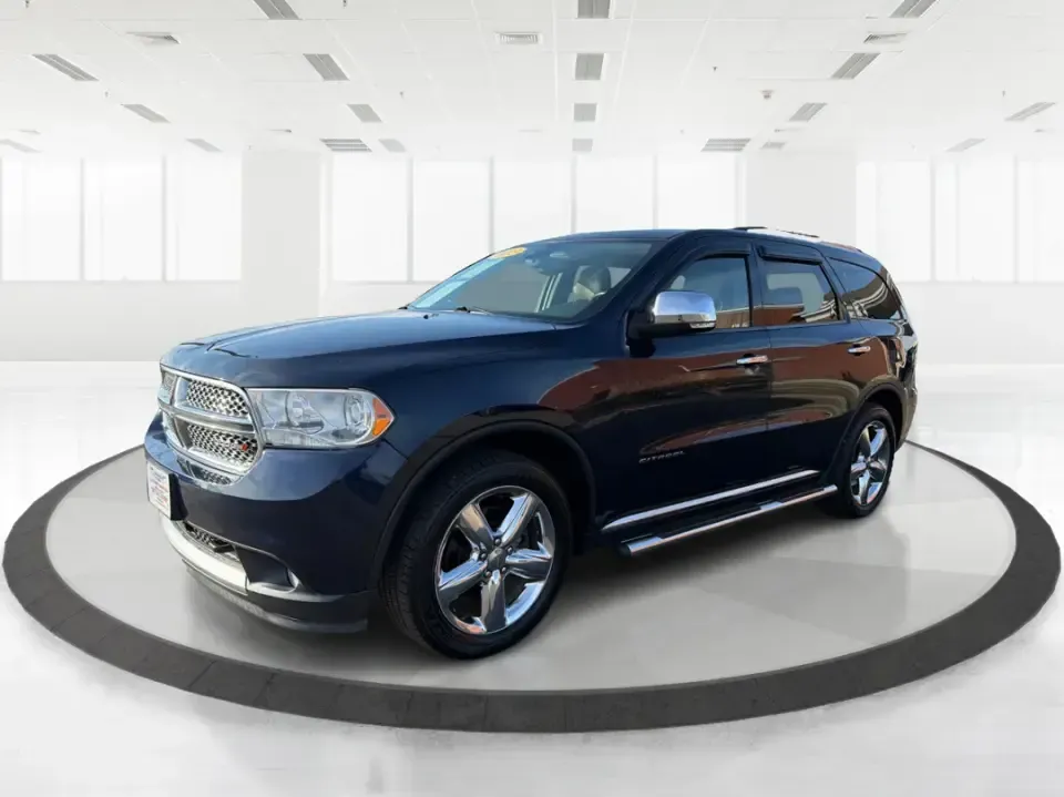 2013 Dodge Durango Citadel (1C4SDJET6DC) with an 5.7L V8 OHV 16V engine, 5-Speed Automatic transmission, located at 8750 N County Rd 25A, Piqua, OH, 45356, (937) 908-9800, 40.164391, -84.232513 - Need one SUV that can handle school drop-offs, I-75 commutes, and a loaded-up weekend trip to Indian Lake or a tailgate in Dayton-without giving up comfort or capability? This 2013 Dodge Durango Citadel in True Blue Pearlcoat is built for real-life Ohio driving, with confident 4WD/AWD traction, V8 p - Photo#8