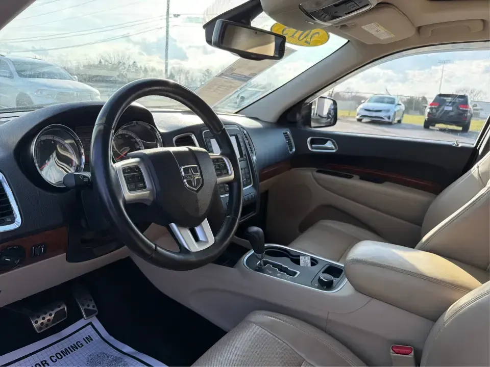 2013 Dodge Durango Citadel (1C4SDJET6DC) with an 5.7L V8 OHV 16V engine, 5-Speed Automatic transmission, located at 8750 N County Rd 25A, Piqua, OH, 45356, (937) 908-9800, 40.164391, -84.232513 - Need one SUV that can handle school drop-offs, I-75 commutes, and a loaded-up weekend trip to Indian Lake or a tailgate in Dayton-without giving up comfort or capability? This 2013 Dodge Durango Citadel in True Blue Pearlcoat is built for real-life Ohio driving, with confident 4WD/AWD traction, V8 p - Photo#9