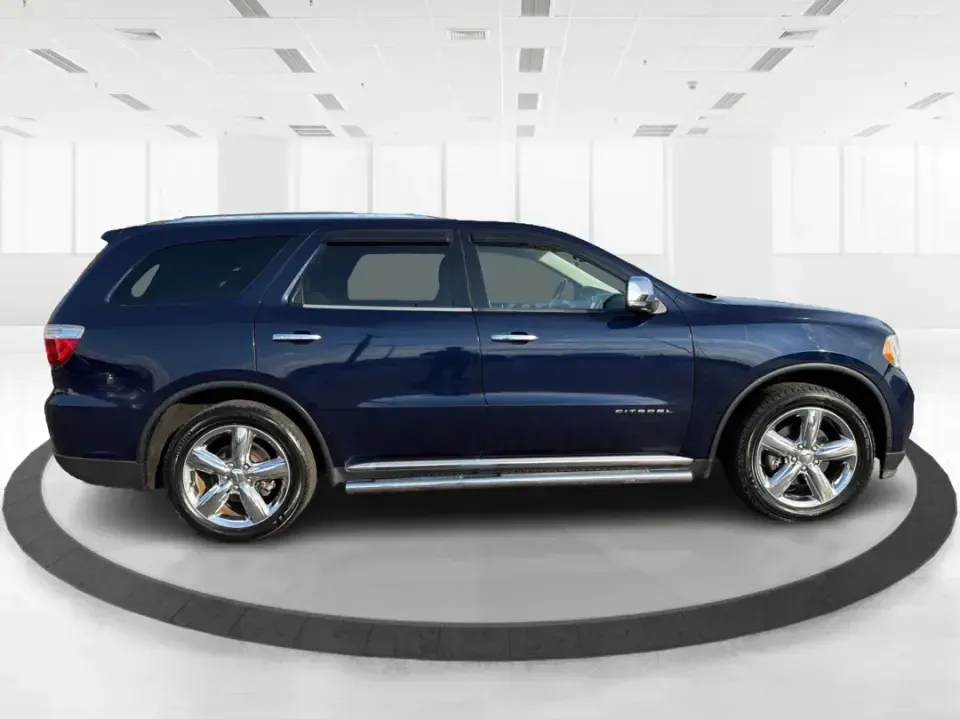 2013 Dodge Durango Citadel (1C4SDJET6DC) with an 5.7L V8 OHV 16V engine, 5-Speed Automatic transmission, located at 1951 S Dayton Lakeview Rd., New Carlisle, OH, 45344, (937) 908-9800, 39.890999, -84.050255 - Need one SUV that can handle school drop-offs, I-75 commutes, and a loaded-up weekend trip to Indian Lake or a tailgate in Dayton-without giving up comfort or capability? This 2013 Dodge Durango Citadel in True Blue Pearlcoat is built for real-life Ohio driving, with confident 4WD/AWD traction, V8 p - Photo#24