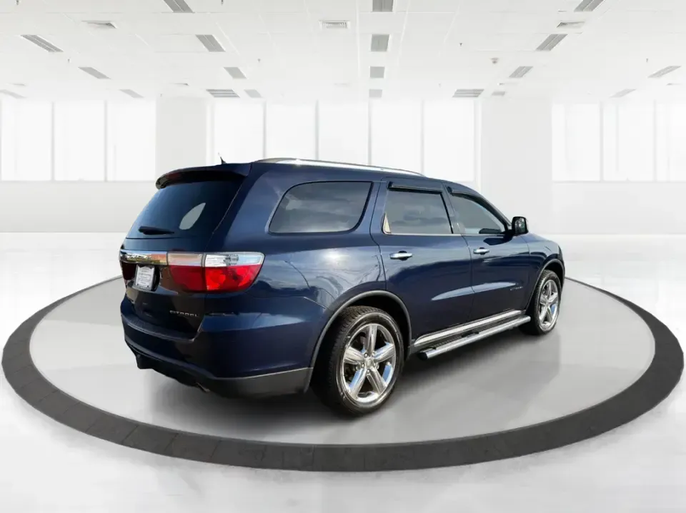 2013 Dodge Durango Citadel (1C4SDJET6DC) with an 5.7L V8 OHV 16V engine, 5-Speed Automatic transmission, located at 1951 S Dayton Lakeview Rd., New Carlisle, OH, 45344, (937) 908-9800, 39.890999, -84.050255 - Need one SUV that can handle school drop-offs, I-75 commutes, and a loaded-up weekend trip to Indian Lake or a tailgate in Dayton-without giving up comfort or capability? This 2013 Dodge Durango Citadel in True Blue Pearlcoat is built for real-life Ohio driving, with confident 4WD/AWD traction, V8 p - Photo#25
