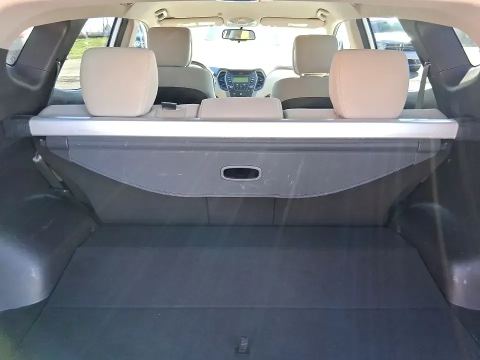 2013 Hyundai Santa Fe Sport (5XYZU3LB7DG) with an Theta II 2.4L I-4 gasoline direct injection engine, 6-Speed Automatic transmission, located at 880 E. National Road, Vandalia, OH, 45377, (937) 908-9800, 39.891918, -84.183594 - Need one SUV that can handle school drop-offs, I75 commutes, and a weekend escape to Taylorsville MetroPark without draining your budget? This 2013 Hyundai Santa Fe Sport is a smart, road-trip-ready crossover that blends everyday practicality with comfort features you'll appreciate on longer drives - Photo#12