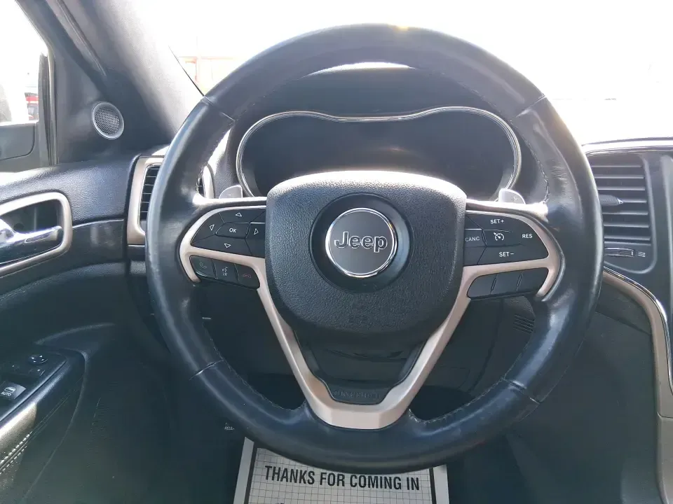 2015 Jeep Grand Cherokee Laredo (1C4RJFAG1FC) with an 3.6L V-6 DOHC engine, 8-Speed Automatic transmission, located at 8750 N County Rd 25A, Piqua, OH, 45356, (937) 908-9800, 40.164391, -84.232513 - Picture your next Ohio road trip: the family loaded up for a weekend at Indian Lake, a cooler in the back, and confidence on wet back roads or winter mornings. This 2015 Jeep Grand Cherokee Laredo is built for drivers who want everyday comfort with true SUV capability-perfect for long commutes, scho - Photo#15