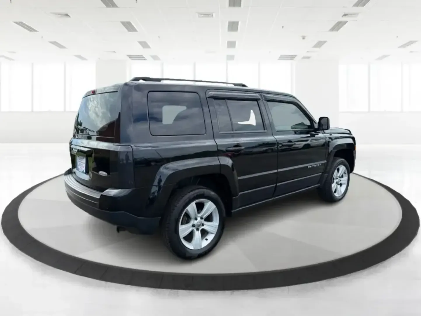 2015 Jeep Patriot Latitude 4WD (1C4NJRFB8FD) with an 2.4L L4 DOHC 16V engine, located at 401 Woodman Dr, Riverside, OH, 45431, (937) 908-9800, 39.760899, -84.123421 - Weekend getaways, snowy commutes, and everyday errands feel a lot easier when you've got an SUV that's ready for whatever Ohio throws your way. This **2015 Jeep Patriot Latitude 4WD** is a practical choice for drivers who want confident traction, versatile cargo space, and a comfortable cabin for fi- Photo#2