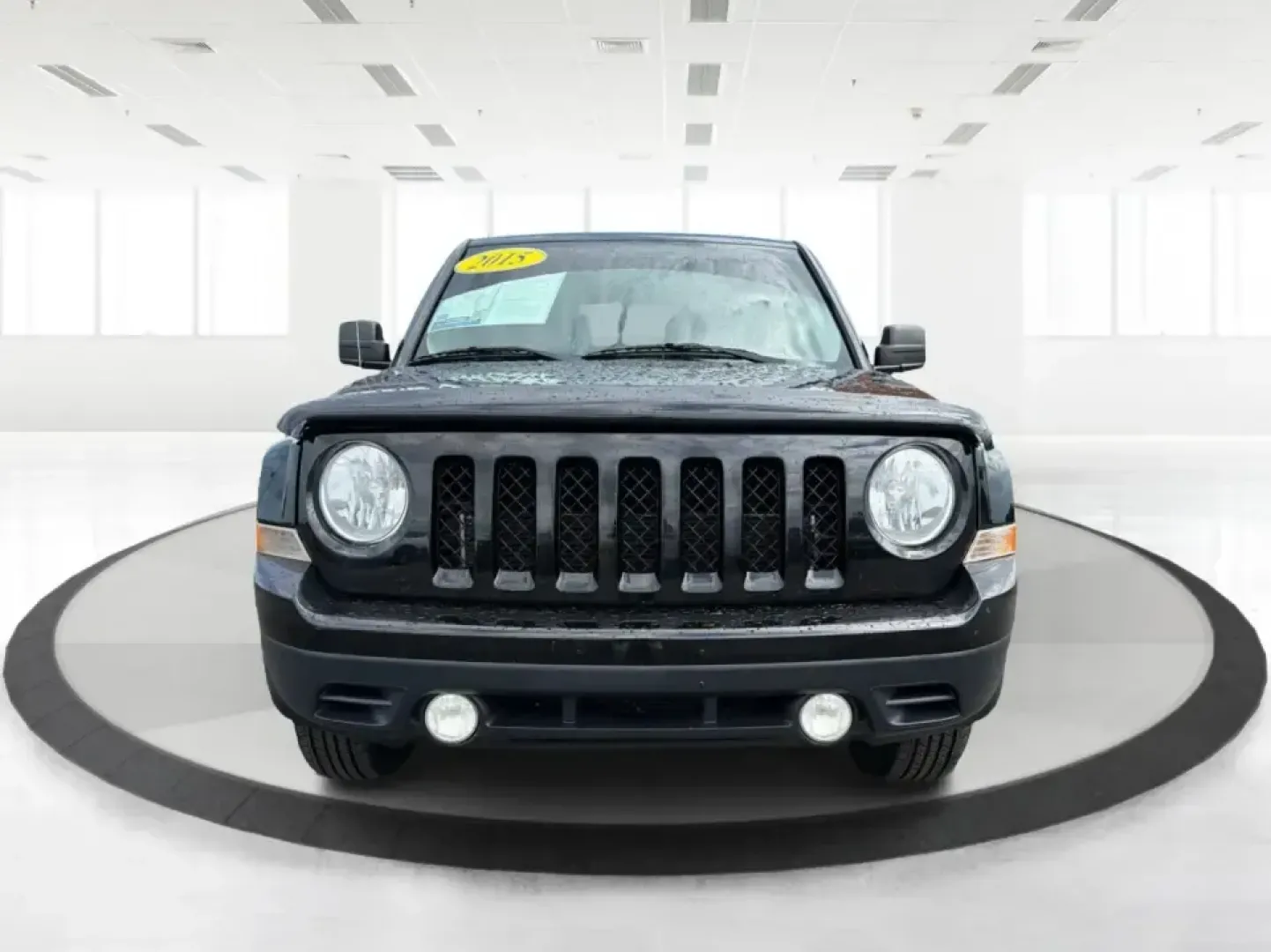 2015 Jeep Patriot Latitude 4WD (1C4NJRFB8FD) with an 2.4L L4 DOHC 16V engine, located at 401 Woodman Dr, Riverside, OH, 45431, (937) 908-9800, 39.760899, -84.123421 - Weekend getaways, snowy commutes, and everyday errands feel a lot easier when you've got an SUV that's ready for whatever Ohio throws your way. This **2015 Jeep Patriot Latitude 4WD** is a practical choice for drivers who want confident traction, versatile cargo space, and a comfortable cabin for fi- Photo#7