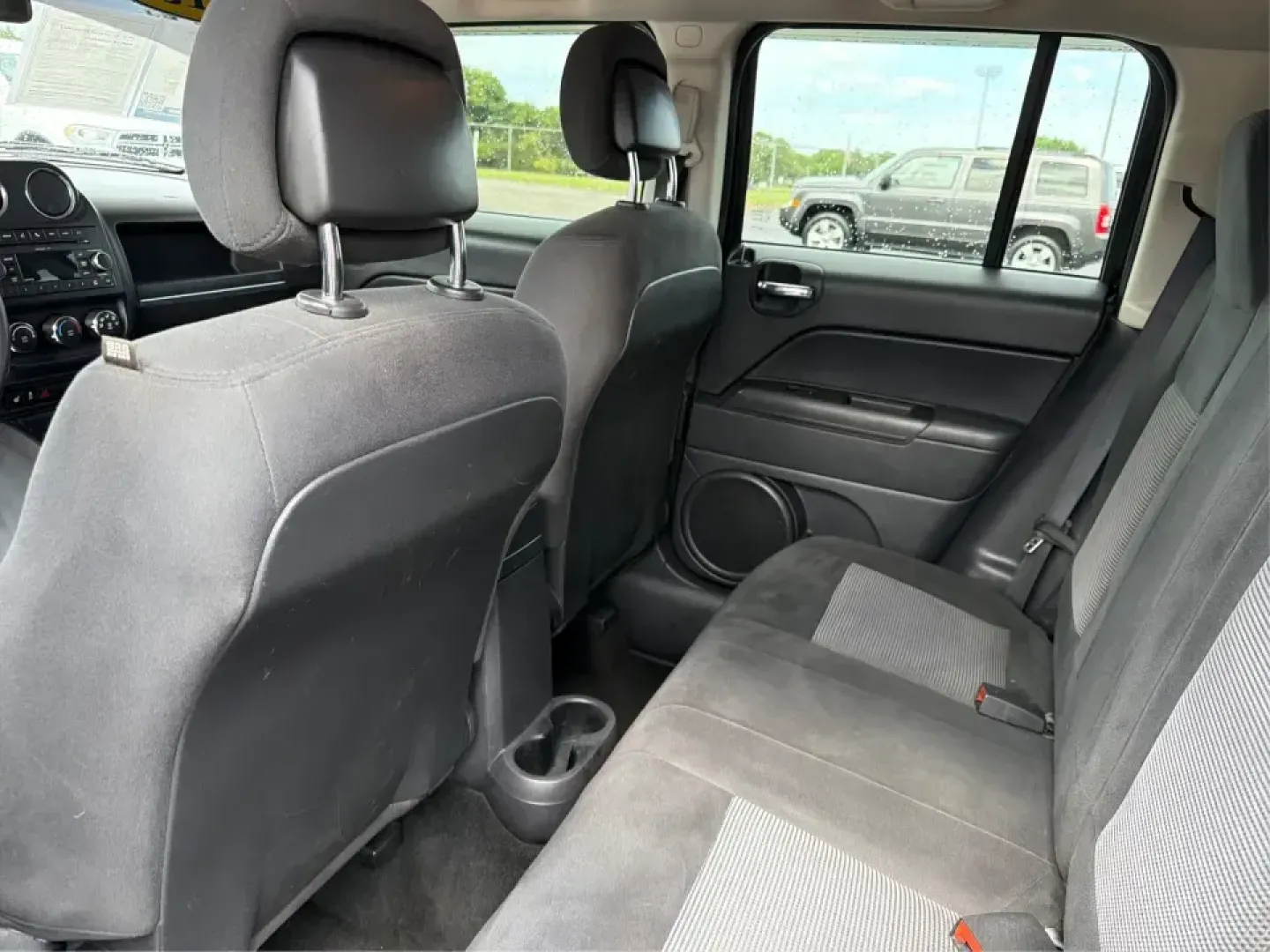 2015 Jeep Patriot Latitude 4WD (1C4NJRFB8FD) with an 2.4L L4 DOHC 16V engine, located at 401 Woodman Dr, Riverside, OH, 45431, (937) 908-9800, 39.760899, -84.123421 - Weekend getaways, snowy commutes, and everyday errands feel a lot easier when you've got an SUV that's ready for whatever Ohio throws your way. This **2015 Jeep Patriot Latitude 4WD** is a practical choice for drivers who want confident traction, versatile cargo space, and a comfortable cabin for fi- Photo#10