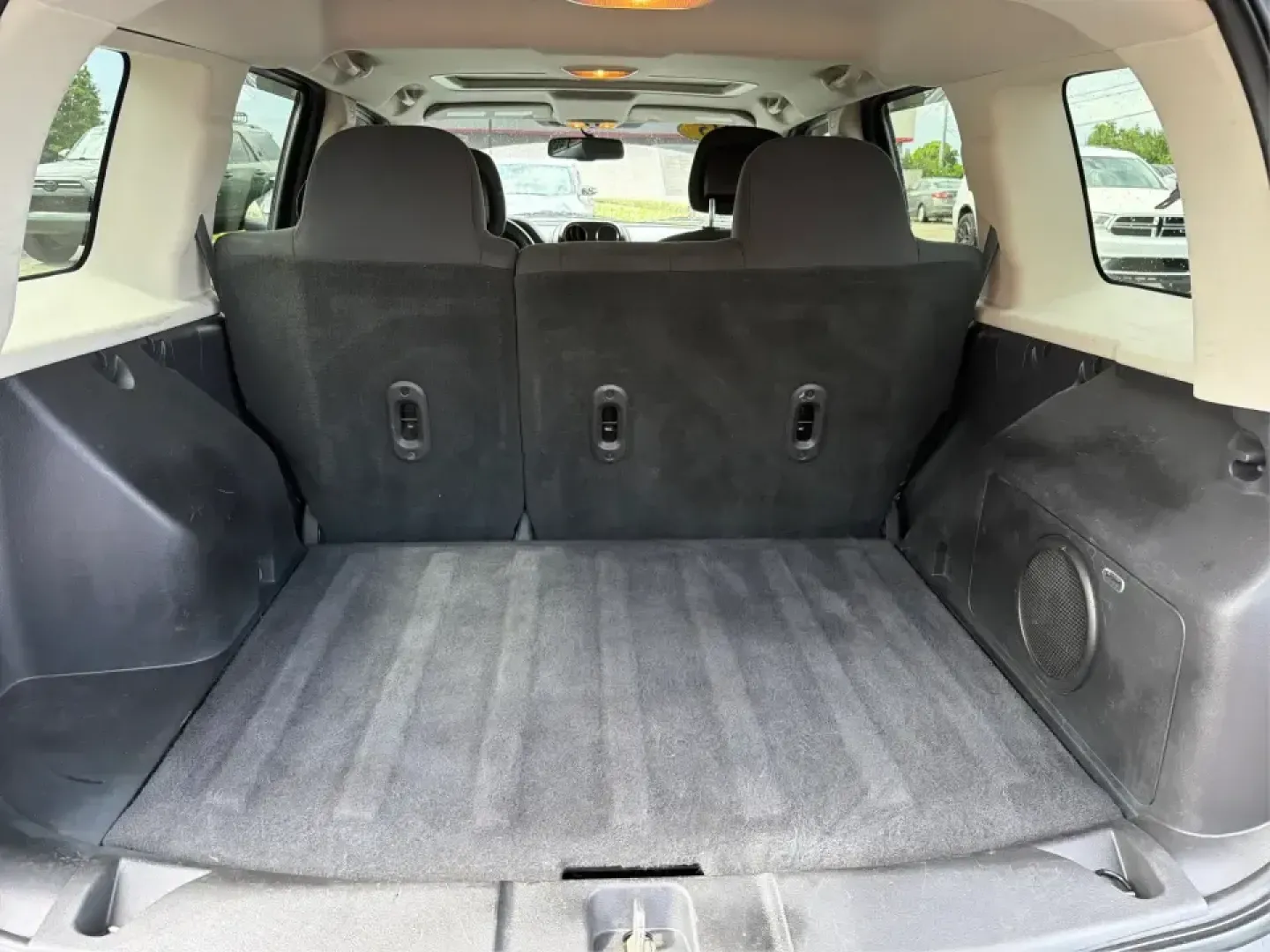 2015 Jeep Patriot Latitude 4WD (1C4NJRFB8FD) with an 2.4L L4 DOHC 16V engine, located at 401 Woodman Dr, Riverside, OH, 45431, (937) 908-9800, 39.760899, -84.123421 - Weekend getaways, snowy commutes, and everyday errands feel a lot easier when you've got an SUV that's ready for whatever Ohio throws your way. This **2015 Jeep Patriot Latitude 4WD** is a practical choice for drivers who want confident traction, versatile cargo space, and a comfortable cabin for fi- Photo#12