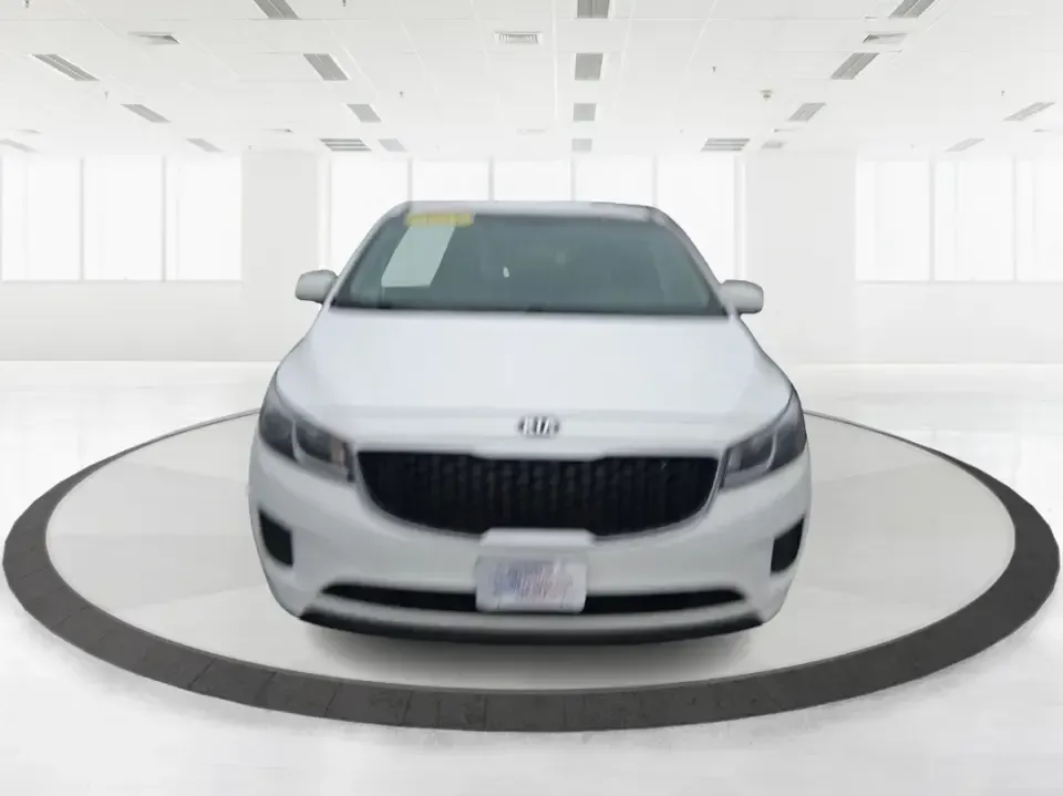 2016 Kia Sedona LX (KNDMB5C11G6) with an Lambda 3.3L V-6 gasoline direct injection engine, 6-Speed Automatic transmission, located at 401 Woodman Dr, Riverside, OH, 45431, (937) 908-9800, 39.760899, -84.123421 - Picture your next weekend: the kids piled in with snacks and sports gear, a cooler in the back, and enough space so everyone can stretch out on the drive down South Dixie Dr toward Dayton's parks, festivals, and family attractions. If you need a dependable, budget-smart people mover that keeps daily - Photo#4