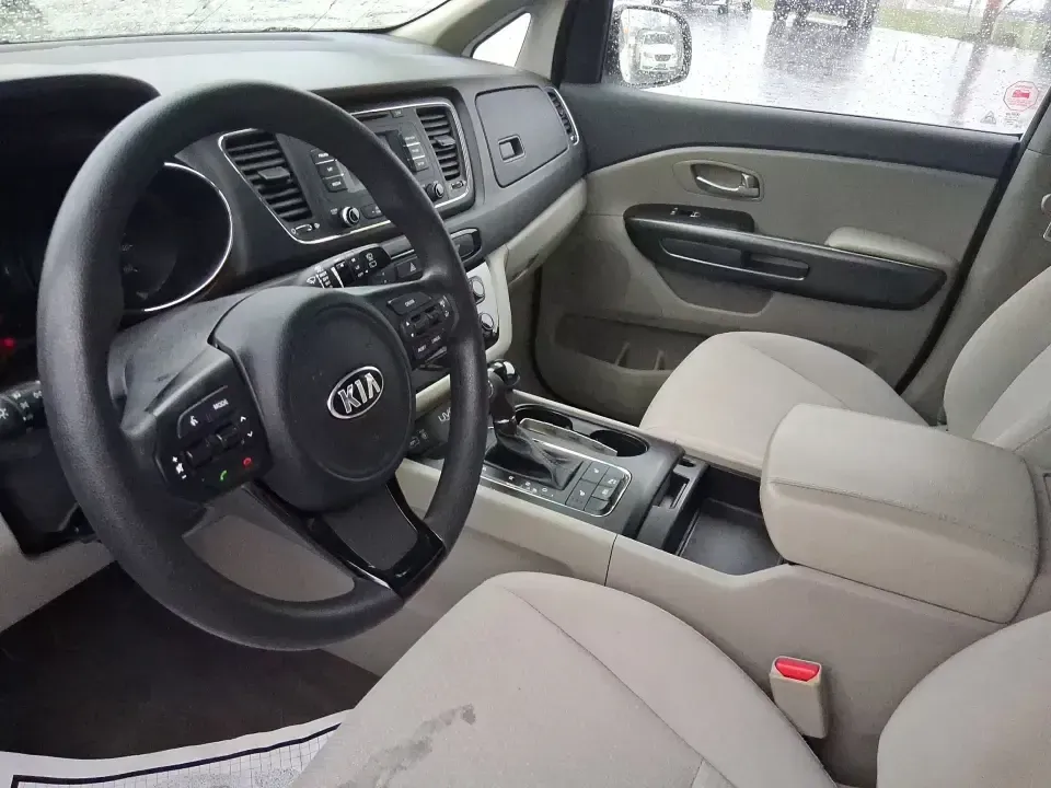 2016 Kia Sedona LX (KNDMB5C11G6) with an Lambda 3.3L V-6 gasoline direct injection engine, 6-Speed Automatic transmission, located at 880 E. National Road, Vandalia, OH, 45377, (937) 908-9800, 39.891918, -84.183594 - Picture your next weekend: the kids piled in with snacks and sports gear, a cooler in the back, and enough space so everyone can stretch out on the drive down South Dixie Dr toward Dayton's parks, festivals, and family attractions. If you need a dependable, budget-smart people mover that keeps daily - Photo#5