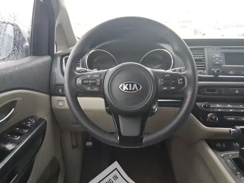 2016 Kia Sedona LX (KNDMB5C11G6) with an Lambda 3.3L V-6 gasoline direct injection engine, 6-Speed Automatic transmission, located at 880 E. National Road, Vandalia, OH, 45377, (937) 908-9800, 39.891918, -84.183594 - Picture your next weekend: the kids piled in with snacks and sports gear, a cooler in the back, and enough space so everyone can stretch out on the drive down South Dixie Dr toward Dayton's parks, festivals, and family attractions. If you need a dependable, budget-smart people mover that keeps daily - Photo#13