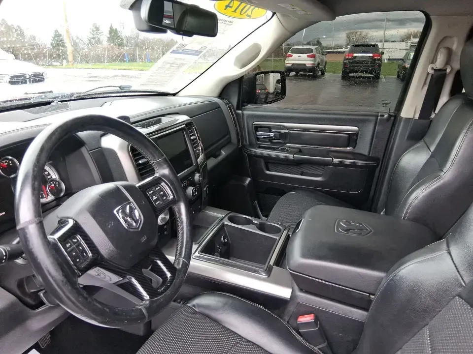 2014 Ram 1500 Sport (1C6RR7MT6ES) with an HEMI 5.7L V-8 variable valve control engine, 6-Speed Automatic transmission, located at 401 Woodman Dr, Riverside, OH, 45431, (937) 908-9800, 39.760899, -84.123421 - Need a truck that can handle weekday work, weekend getaways, and everything Ohio weather throws at you? This Flame Red Clearcoat 2014 Ram 1500 Sport Crew Cab 4WD is built for real life-hauling project supplies to a home in Riverside, towing toys for a day near Eastwood MetroPark, or loading up the f - Photo#9