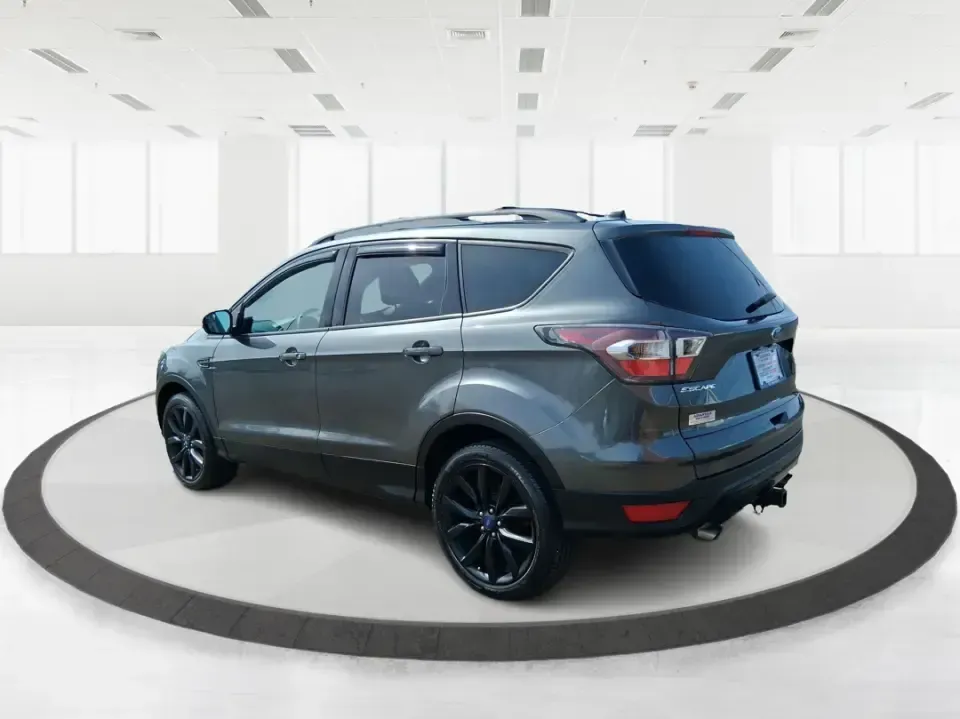 2017 Ford Escape SE (1FMCU9GD2HU) with an 1.5L L4 DOHC 16V engine, 6A transmission, located at 880 E. National Road, Vandalia, OH, 45377, (937) 908-9800, 39.891918, -84.183594 - Make every day easier-whether you're tackling a long commute up I-75, shuttling kids between school and practice, or packing up for a weekend escape to the Dayton area parks. This 2017 Ford Escape SE in Magnetic Metallic is the kind of compact SUV that fits real life in Vandalia, OH: easy to park, c - Photo#3
